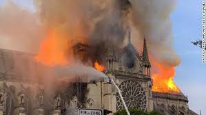 Firefighters battling flames that engulfed cathedral.    