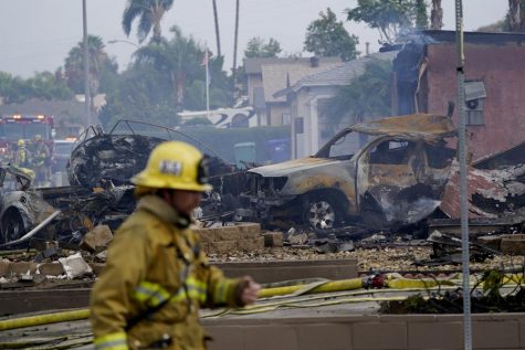 Fire crews work the scene of a small plane crash, Monday, Oct. 11, in Santee. Photo courtesy of AP News.