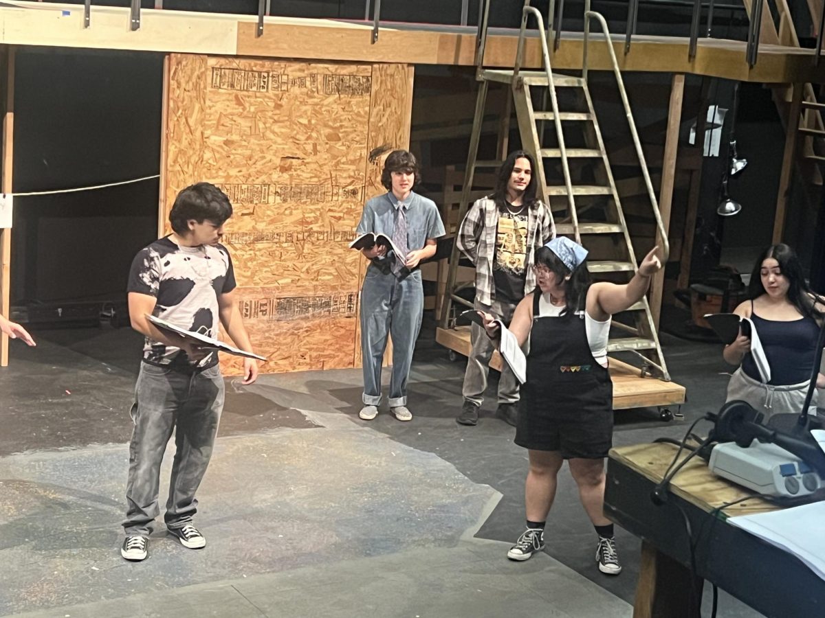 Cast members rehearse for opening day.