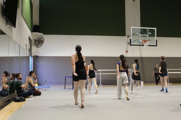 Gina Sorensen and Kyle Sorensen, seated on left, watch as students rehearse for Entrances & Exits