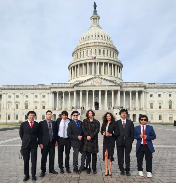 Vi Huynh (second from left) and the rest of ASGC stand in front of the United States Capitol during a recent trip to Washington, D.C.